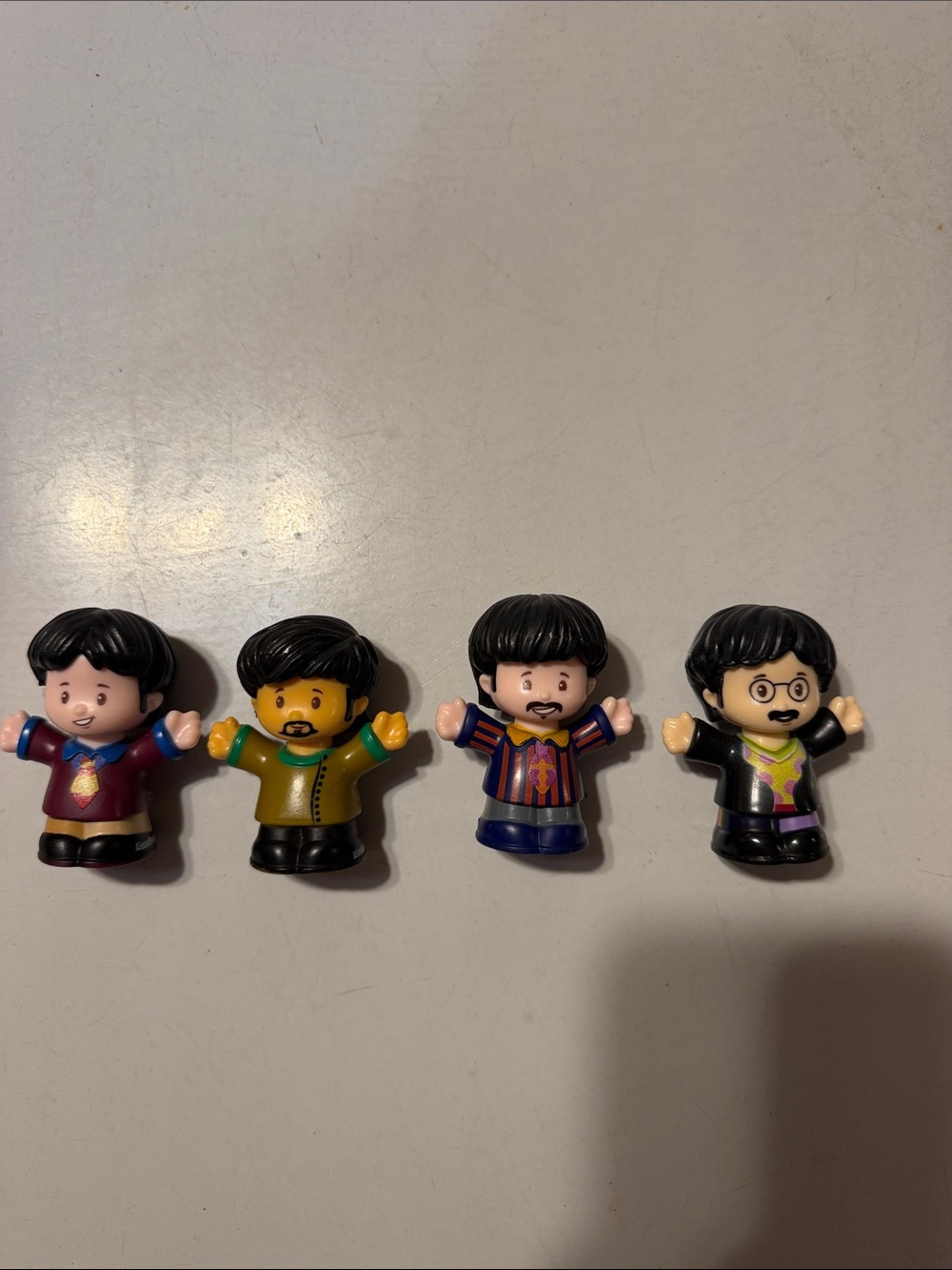 Fisher-Price Four-Piece Multicolor Mini Figure Set